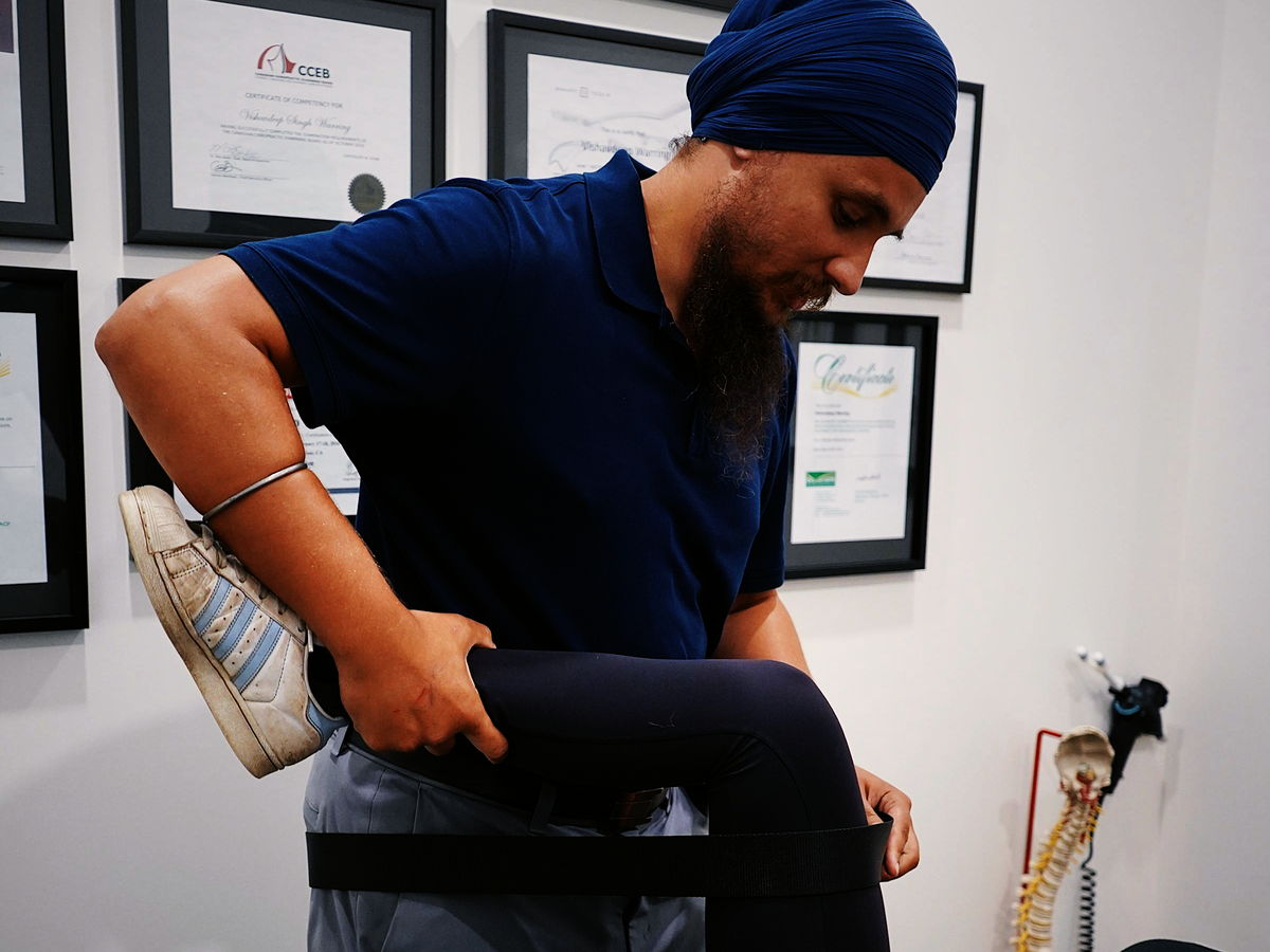Physiotherapist treating a patient